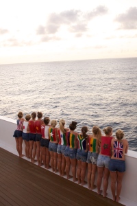 Photo: Laura Fraser - Fraser and her peers carrying on a tradition on the MV Explorer: girls paint the flags of the countries visited on their backs.